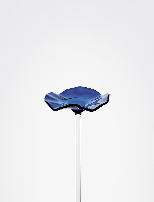 Fiore di vetro blu su stelo