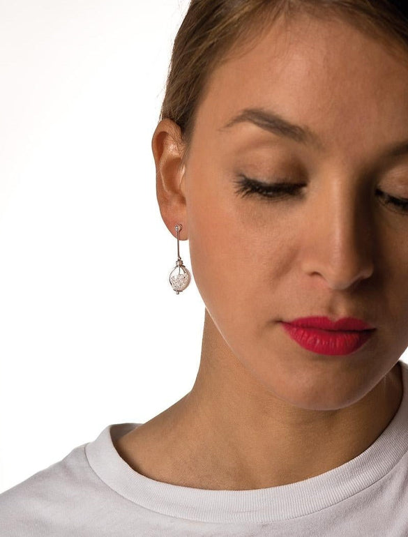 Minima, earrings musical note-shaped