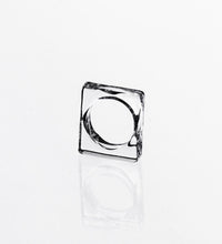 Quadro, square ring in glass