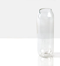 Ibridi, caraffa e bicchiere in vetro